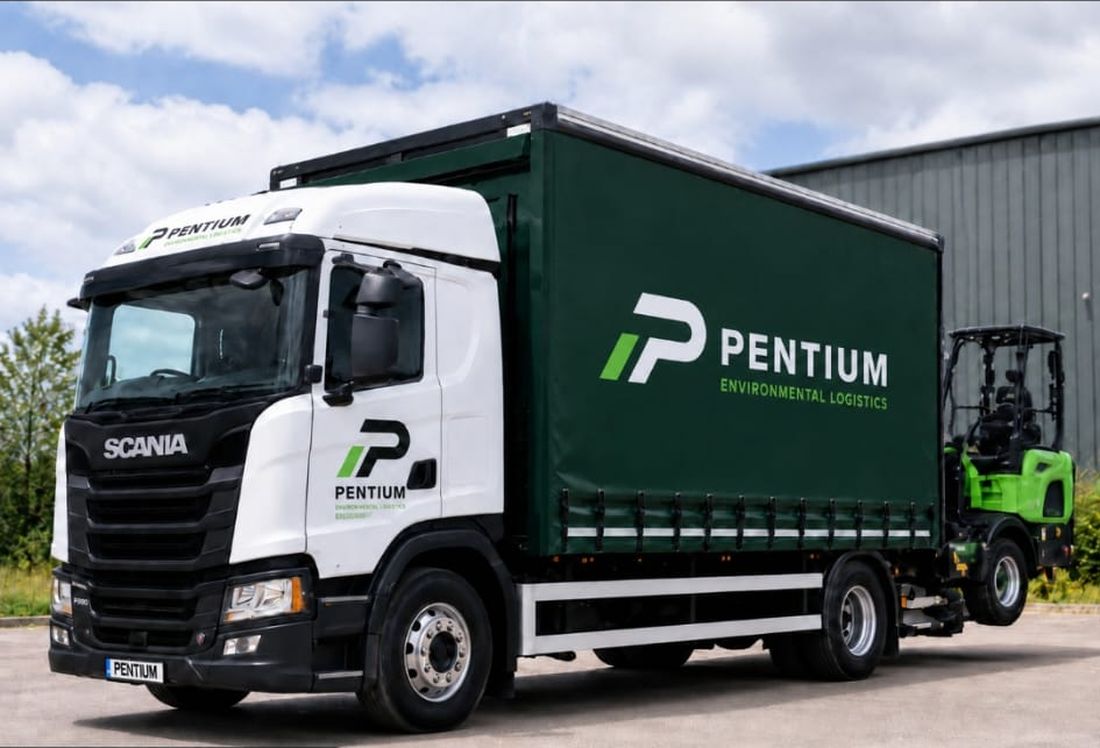 Pentium Environmental Logistics rigid with a Moffett mounted forklift carried on the back